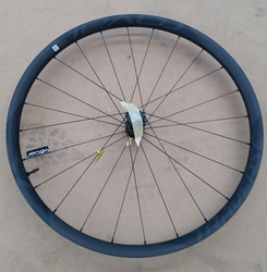 Specialized WHL MY15 TRAVERSE SL, 27.5, FRONT, CARBON, TA, 15X100MM, DISC, 6-BOLT, 24H (LFM07) - SATIN CARBON W/ BLACK DCL - Produktbild - 1