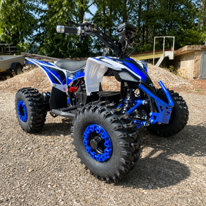 Blaues Elektro Quad mit Differential – Optimal für Kinder, die ein sicheres und robustes Fahrzeug suchen.