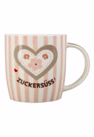 eine rosa cremeweiß gestreifte Henkeltasse aus Porzellan mit dem dunkelbraunen Schriftzug "Zuckersüss" und darüber ein großes Herz mit Blümchen