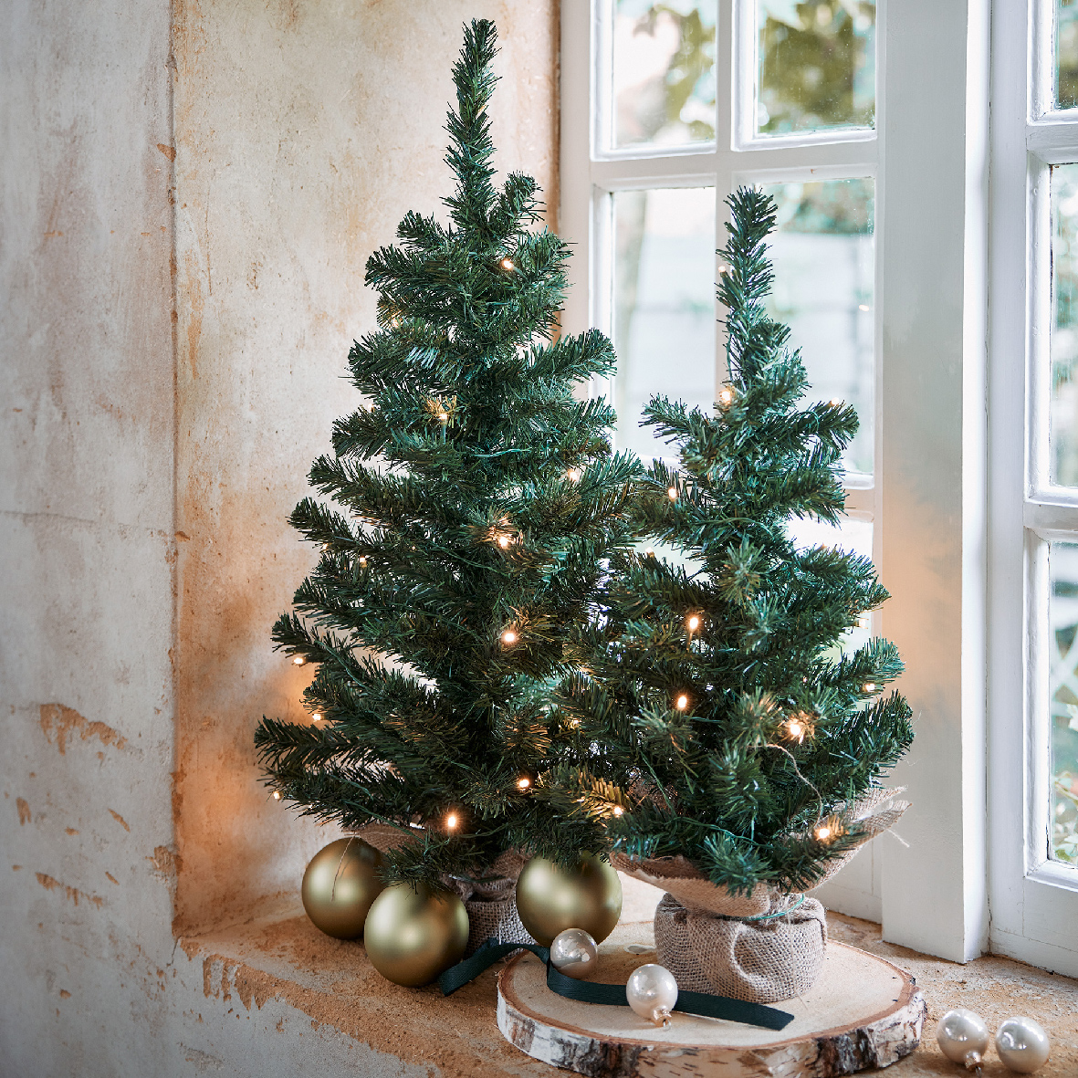 Tannenbaum künstlich im Jutesack 90cm grün