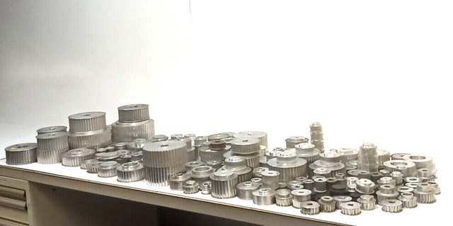 Lot of timing pulleys in various sizes and types approx. 130pcs.