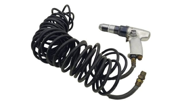 Compressed air drill with spiral hose
