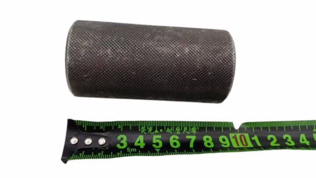 A knurled metal part approx. 90 mm knurled sleeve