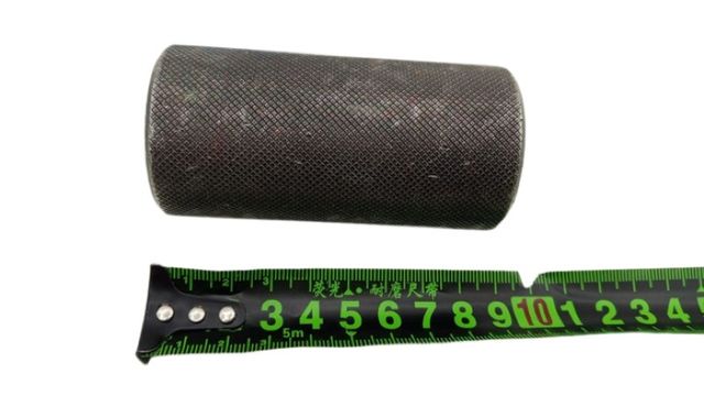 A knurled metal part approx. 90 mm knurled sleeve