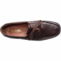 Men's leather Shoes Dark Brown Interior view of men's moccasin shoes featuring a round-toe cap and lace fastener. The design includes a decorative leather strap for added style and a comfortable fit. These genuine cowhide leather shoes have a block heel and a classic shoelace closure.