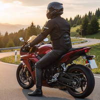 Motorcyclist on a red sportbike wearing a black jacket with  a kidney belt