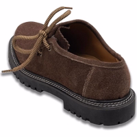 Back view of elegant traditional Bavarian shoes featuring a rubber sole and block heel. Crafted from 100% suede leather with a soft leather interior for added comfort. Shop now and buy online to add this refined design to your collection.