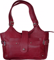 Women's leather handbag from German Wear German Wear Women’s Leather Handbag in red, crafted from genuine cowhide leather. Tote bag with removable strap, zipper & magnetic closure, front zip pocket, internal compartments for phone & valuables, perfect for everyday use or special occasions.