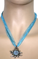 Trachten Edelweiß-Halskette von German Wear German Wear Trendige Damenhandtasche aus echtem Rindsleder in Beige und Schwarz. Mit abnehmbarem Riemen, Tragegriff, Reißverschluss und geräumigen Fächern. Elegante Tasche für Büro, Freizeit oder besondere Anlässe.