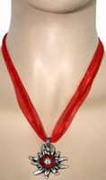 Traditional Edelweiss Necklace from German Wear Traditional Edelweiss Pendant Necklace by German Wear with red satin chiffon ribbon, 3.5cm rhinestone-studded pendant, and secure lobster clasp. Perfect Bavarian choker for Oktoberfest.