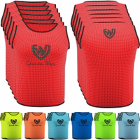 Front and back view of German Wear 6-Pack Soccer Red Bibs made from breathable micropolyester with mesh texture short sleeves and elastic fit ideal for soccer and team training sessions buy online today.