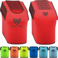 Front and back view of German Wear 10-Pack Soccer Red Bibs made with breathable air mesh fabric and short sleeves, durable elastic material for multi-sport training sessions and team practice, buy now