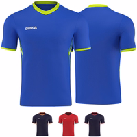 OMKA Men's Polyester Soccer Jersey - Teamwear for Football Front and rear views of the Omka sport shirt, featuring a blue base with green accents. This jersey, designed for sports enthusiasts, is suitable for soccer, volleyball, and handball. It is styled as a World Cup jersey, perfect for fans and sports events.