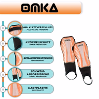 OMKA neon orange shin guards feature view, showcasing lightweight construction, ergonomic fit, and ankle protection support.