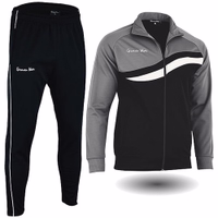 STRIKER Men's Track Suit with gray/black zip jacket and black pants. White wave stripe and "German Wear" text on front.