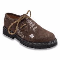 Traditional Bavarian shoes crafted from brown cowhide leather. These handmade haferl shoes feature side lacing and a block heel. The design includes a short shaft and is made from suede leather, embodying classic German wear.