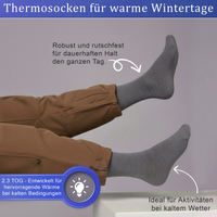 Close-up of a thermal sock, sock lying flat, surface visible, German text present