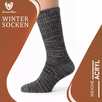 Thermo-Wintersocken im 3er-Pack, atmungsaktiv, bequem, strapazierfähig, grau GermanWear-Label an Thermosocken, Verpackung teilweise sichtbar, deutscher Text lesbar