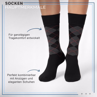 12er-Pack Argyle-Baumwollsocken – klassisches Rautenmuster, Business- und Freizeitsocken, Schwarz Vorderansicht einer schwarz Business-Anzugsocke mit Argyle-Muster, deutscher Text im Hintergrund sichtbar