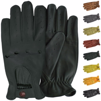 Front & rear view of luxury of German Wear Driving Gloves. Crafted from soft lamb-nappa leather, these stylish gloves offer a retro design, push-button closure, and open palm-back. Available in black, grey, and more. Free next-day delivery