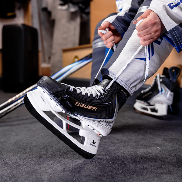 BAUER Vapor FLYLITE Senior Ice Hockey Skates – Lacing Up in the Locker Room BAUER Vapor FLYLITE Senior Ice Hockey Skates – Lacing Up in the Locker Room