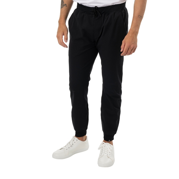 BAUER FLC Core Woven Jogger Senior Black – Front View Black BAUER FLC Core Home Ice Woven Jogger Senior worn by model, front view