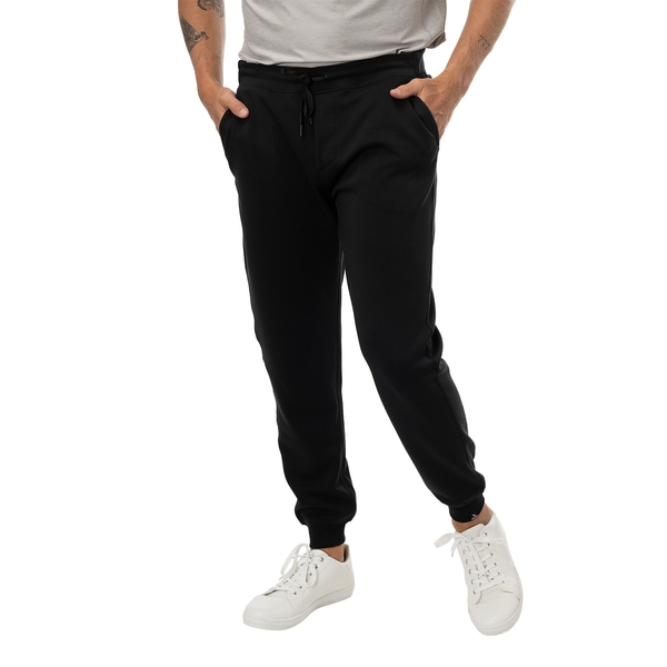 BAUER FLC Core Knit Jogger Senior in black, worn in a three-quarter view