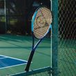Dunlop FX 500 2026 tennis racket – lifestyle view 3 Dunlop FX 500 2026 tennis racket – lifestyle view 3