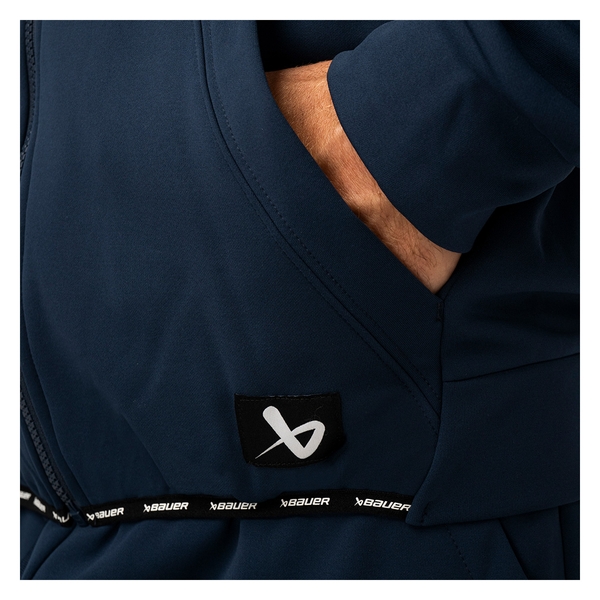 BAUER Team Fleece Zip Hoodie Senior Marineblau: Kängurutasche, Saumband und BAUER-Logo im Detail