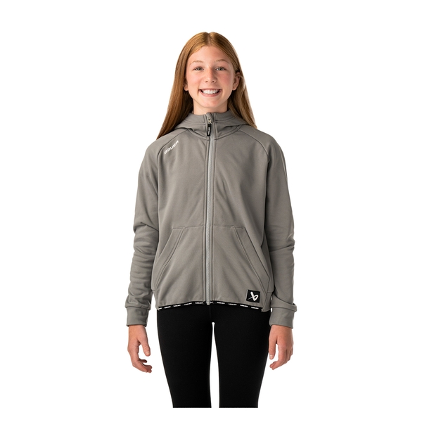BAUER Team Fleece Zip Hoodie Youth Grau – Zweite Vorderansicht BAUER Team Fleece Zip Hoodie Youth Grau Youth am jungen Model mit sichtbarer Kapuze und Kängurutasche