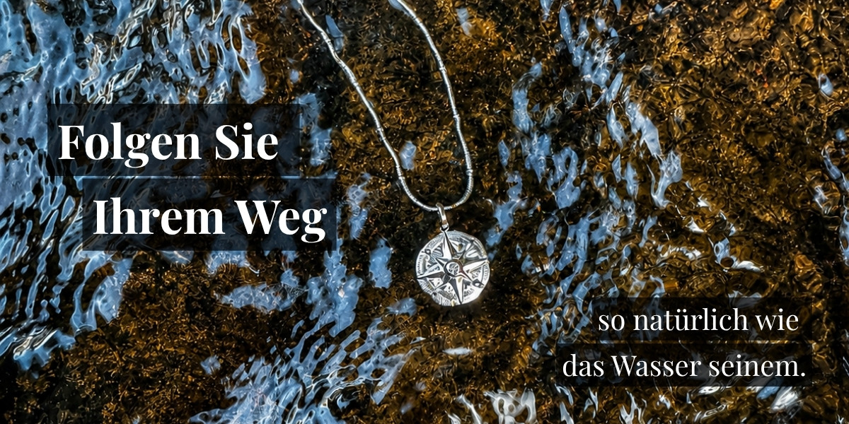 Stimmungsbild Windrose Anhänger im Wasser