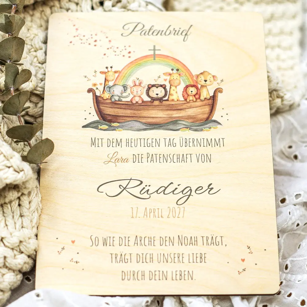 Patenbrief aus Holz, beschriftet mit Datum und Taufspruch